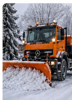 Unimog beim Schneeräumen im Winterdienst